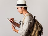 hipster-style-tourist-writing-clipboard